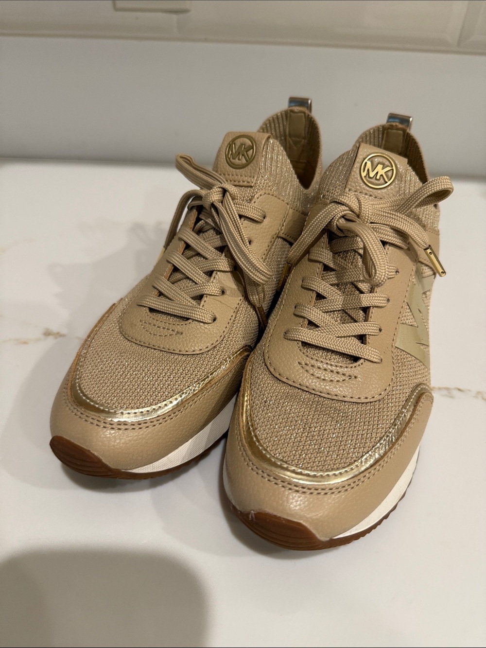 Michael Kors Beige Knit & Leather Logo Sneaker with Gold Accent
Good condition